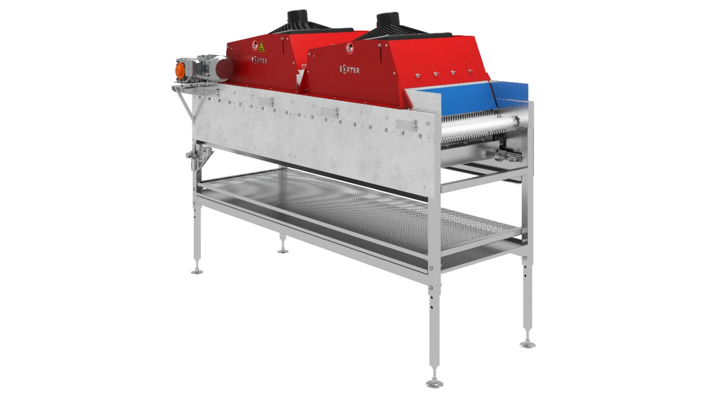 Przemysłowa maszyna do sortowania lub klasyfikowania ze stali nierdzewnej z czerwono-czarnym blatem, niebieskimi szczotkami i panelem sterowania po lewej stronie, wsparta na czterech nogach i spodniej półce.