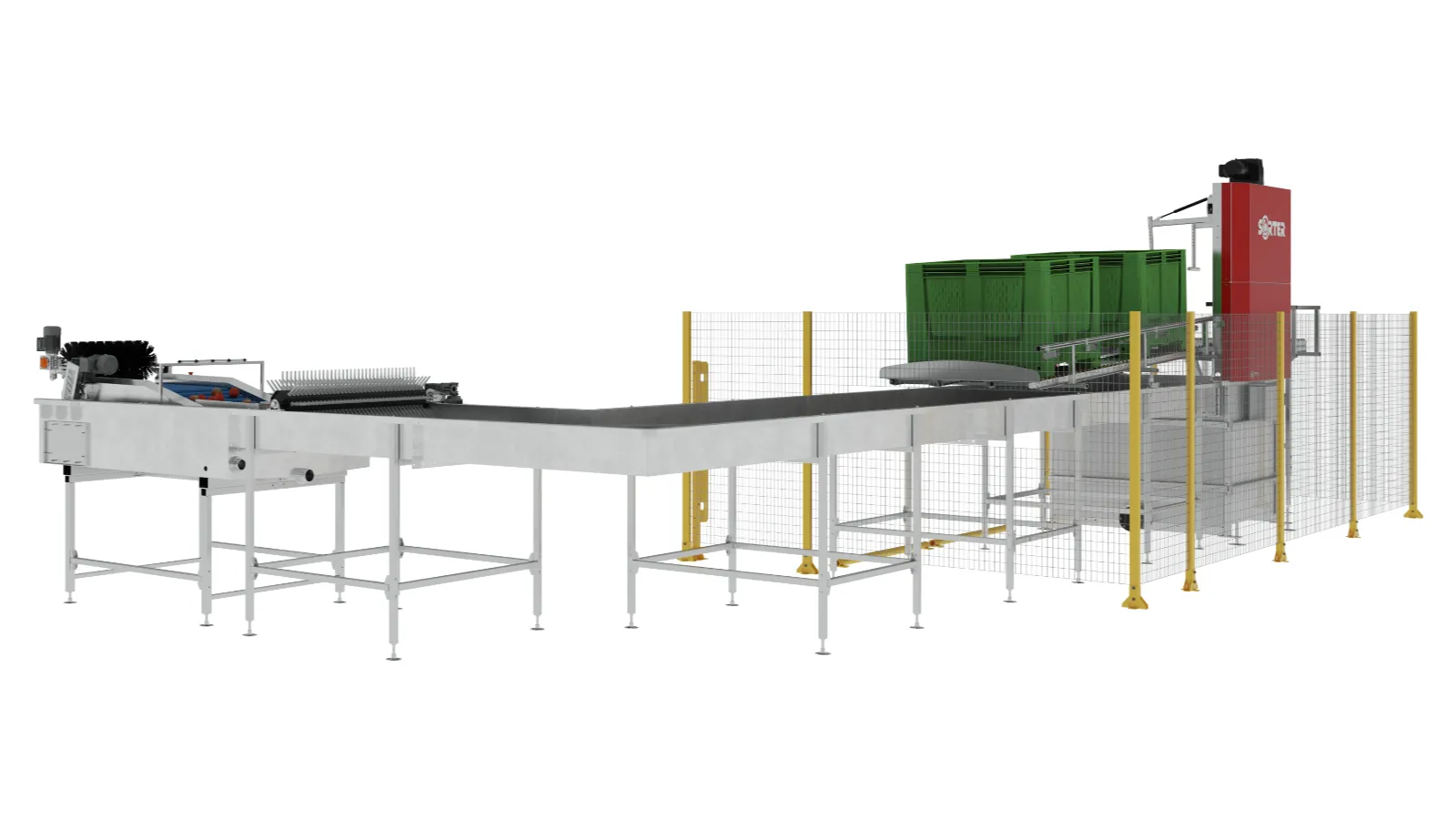 Industrial conveyor system with metal frame, black belt, safety fence, machinery on the left, and stacked green crates near a red vertical machine on the right.